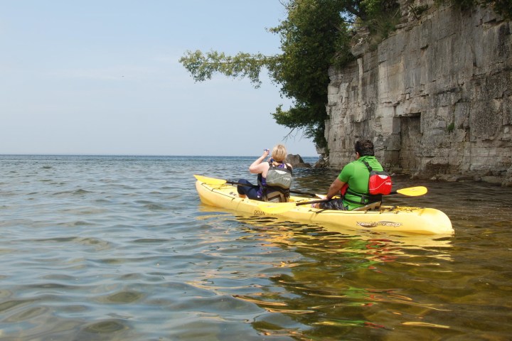 a person riding a surf board in the water