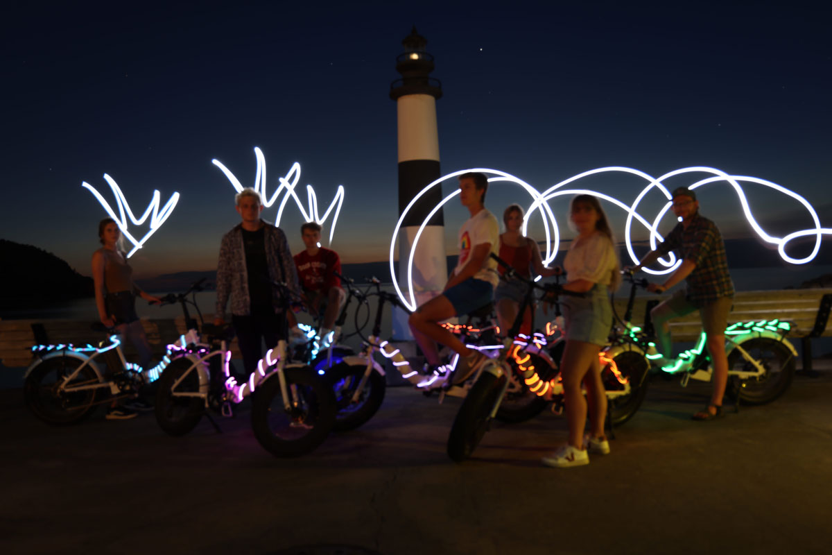 glow-roll a group of people performing on a stage
